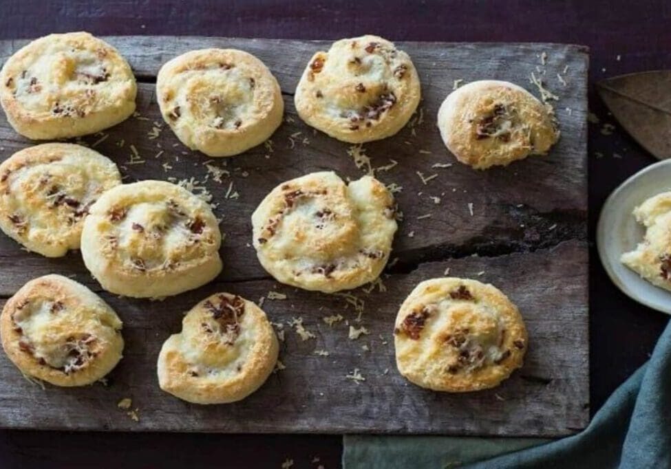 A wooden board with some cookies on it